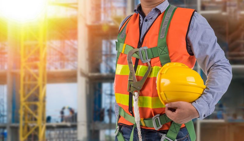 Man with fall arrest system after online fall protection training in California