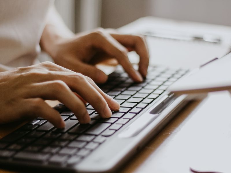 Man on computer for HAZWOPER training online in Oklahoma